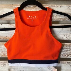 Wilo the Label Women's Ribbed Contra Sports Bra Orange and Navy Blue, size XS.